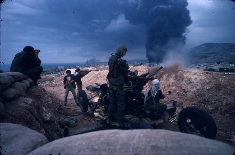 30292 02: An unidentified group of guerillas firing the 30mm November 3, 1983 near Tripoli, Lebanon. Fifty-five loyalist fighters were dead when the conflict ended. (Photo by Roland Neveu/Liaison)