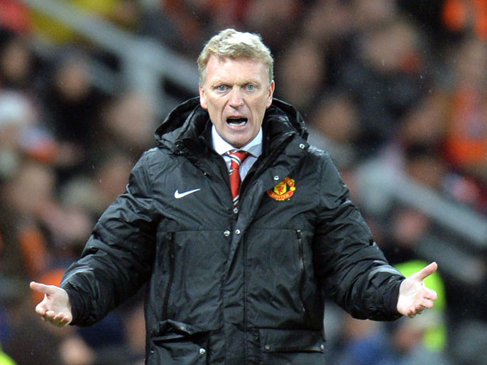 Manchester United FC coach David Moyes reacts during the European Champions League football match FC Shakhtar vs Manchester United in Donetsk on October 2, 2013. AFP PHOTO/ SERGEI SUPINSKY