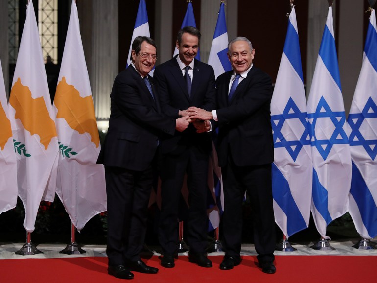 Cypriot President Nicos Anastasiades, Greek Prime Minister Kyriakos Mitsotakis and Israeli Prime Minister Benjamin Netanyahu pose for a photo before signing a deal to build the EastMed subsea pipeline to carry natural gas from the eastern Mediterranean to Europe, at the Zappeion Hall in Athens, Greece, January 2, 2020. REUTERS/Alkis Konstantinidis