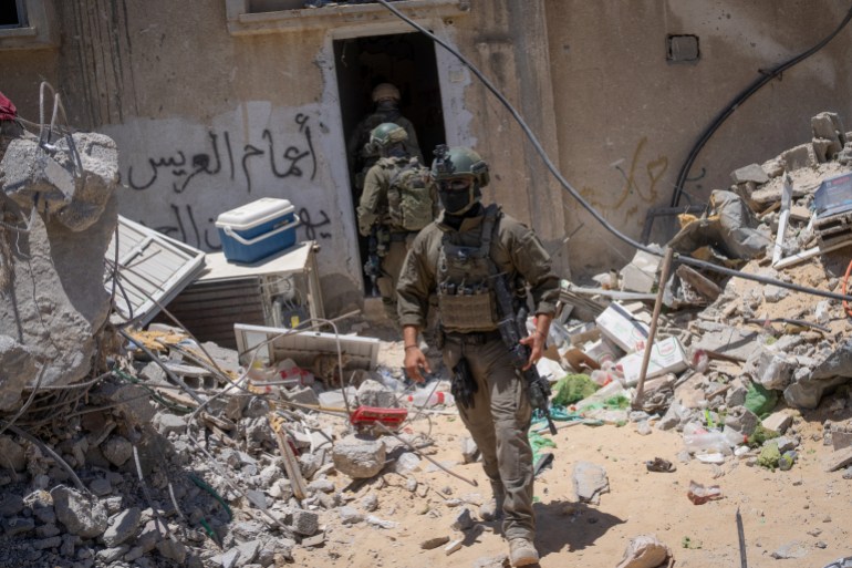 Israeli soldiers operate during a ground operation in the southern Gaza Strip, amid the Israel-Hamas conflict, July 3, 2024. The Israeli military invited reporters for a tour of Rafah, where the military has been operating since May 6. Ohad Zwigenberg/Pool via REUTERS EDITOR'S NOTE: POOL PHOTOGRAPHS WERE REVIEWED BY THE IDF AS PART OF THE CONDITIONS OF THE EMBED. NO PHOTOS WERE REMOVED