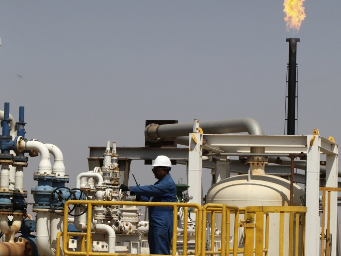 A flame rises from a chimney at Taq Taq oil field in Arbil, in Iraq's Kurdistan region, August 16, 2014. Picture taken August 16, 2014. REUTERS/Azad Lashkari (IRAQ - Tags: ENERGY BUSINESS COMMODITIES)