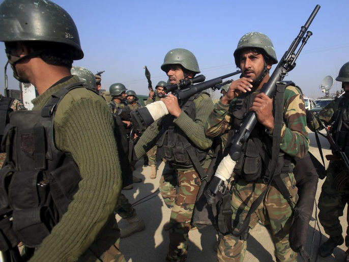 Army soldiers walk outside the Bacha Khan university in Charsadda, Pakistan, January 20, 2016. . REUTERS/Fayaz Aziz TPX IMAGES OF THE DAY