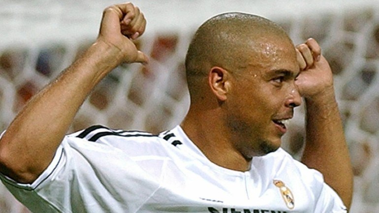 Real Madrid's Brazilian striker Ronaldo Nazario de Lima celebrates after scoring against Olympique Marseille during their Champions League group F soccer match at the Santiago Bernabeu stadium in Madrid Tuesday Sept. 16, 2003. EPA PHOTO/EFE/Fernando Alvarado//