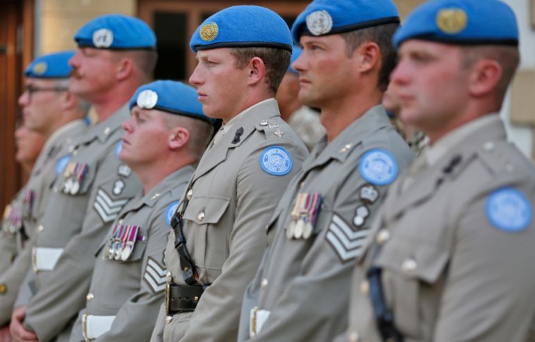 NICOSIA, CYPRUS - SEPTEMBER 18: Members of the British Royal Engineers serving in the United Nations Peace Keeping Force in Cyprus (UNFICYP) attend a thanksgiving service for the late Queen Elizabeth II, at St. Paul's Anglican Cathedral, on September 18, 2022 in Nicosia, Cyprus. Queen Elizabeth II died at Balmoral Castle in Scotland on September 8, 2022, and is succeeded by her eldest son, King Charles III. (Photo by Alexis Mitas/Getty Images)