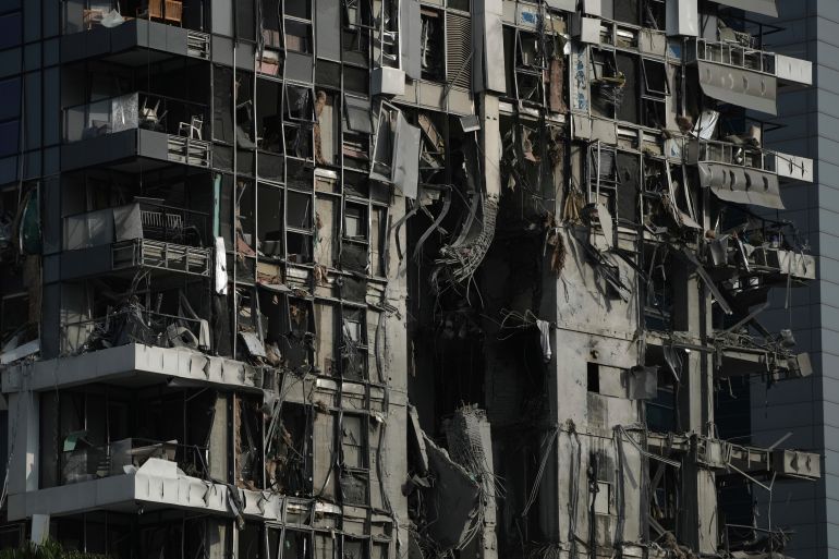 A residential building that was struck by a missile fired from Iran, is seen in Tel Aviv, Israel, on Saturday, June 14, 2025. (AP Photo/Leo Correa)
