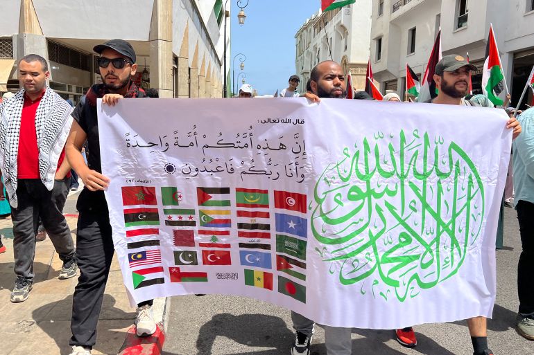 شعار مسيرة الرباط " مع وحدة الامة ضد العدوان مع المقاومة حتى التحرير وإسقاط التطبيع