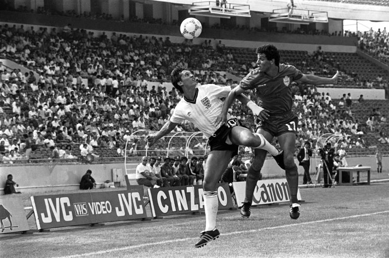 Gary Lineker of England, left, and Moroccos Khairi Abderrazak tussle for the ball, during England Vs Morocco World Cup Group F. football match in Monterrey, Mexico, on June 6, 1986. The game ended in a 0-0 draw. (AP Photo)