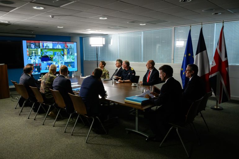 LONDON, ENGLAND - JULY 10: British Prime Minister Keir Starmer and French President Emmanuel Macron host a meeting of the Coalition of the Willing during a joint military visit to the Northwood Headquarters, on July 10, 2025 in London, England. President Emmanuel Macron and Mrs Brigitte Macron visit the UK in the first visit State Visit made by France in 17 years. They are staying at Windsor Castle, hosted by King Charles III and Queen Camilla, and a banquet will be held there in their honour. The Macrons will visit Imperial College, and the President will address Parliament during his stay. (Photo by Leon Neal/Getty Images)