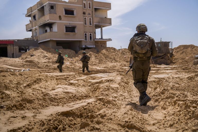 FILE PHOTO: A picture released by the Israeli Army says to show Israeli soldiers conducting operations in a location given as Tel Al-Sultan area, Rafah Governorate, Gaza, in this handout image released April 2, 2025. Israeli Army/Handout via REUTERS THIS IMAGE HAS BEEN SUPPLIED BY A THIRD PARTY/File Photo