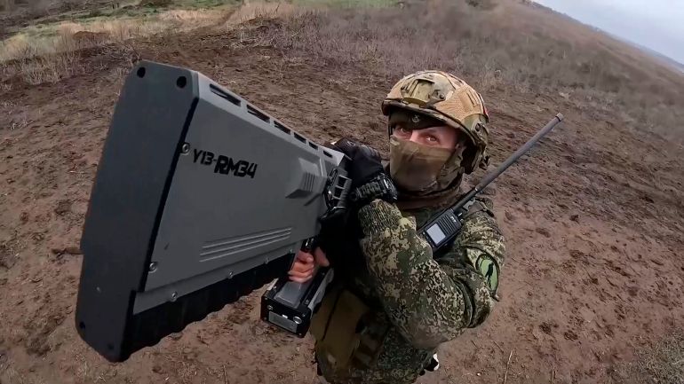 In this photo, taken from video and released by the Russian Defense Ministry Press Service on Thursday, Jan. 16, 2025, a Russian soldier gets ready to shoot Ukrainian drones on an undisclosed location in Ukraine. (Russian Defense Ministry Press Service via AP)